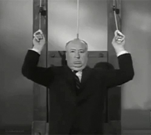 alfred-hitchcock-guillotine.gif.aa6152d75b35157f5ab3a33f15f9eb04.gif