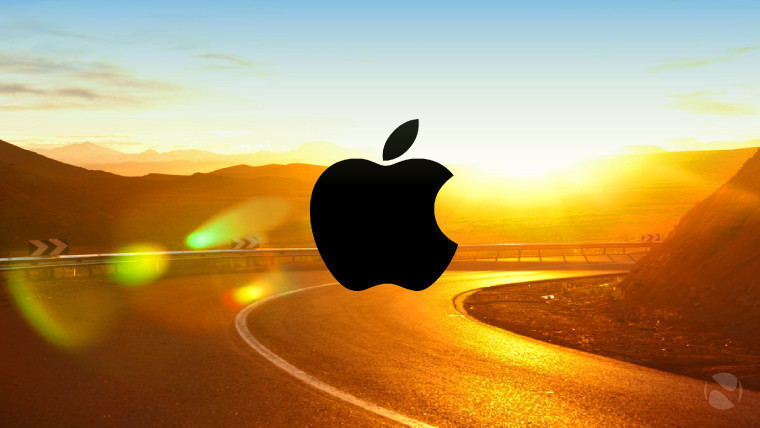 Apple logo with a beautiful sunny road in the backdrop