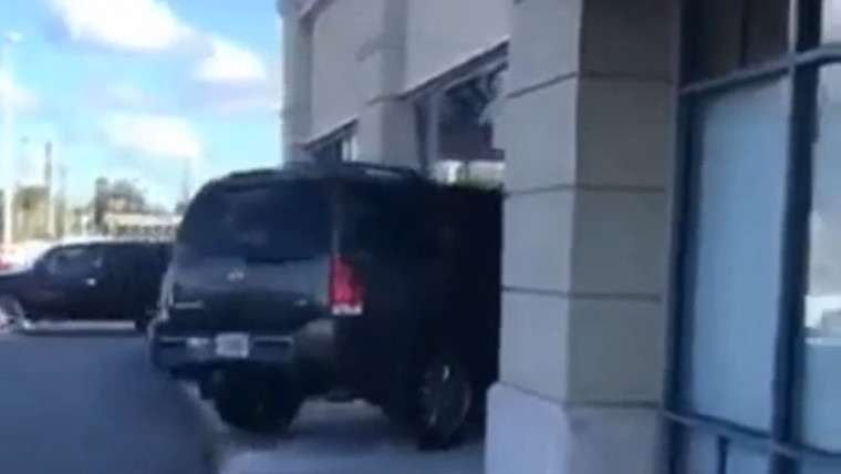 Woman having a 'bad day' smashes car into T-Mobile store after dispute ...