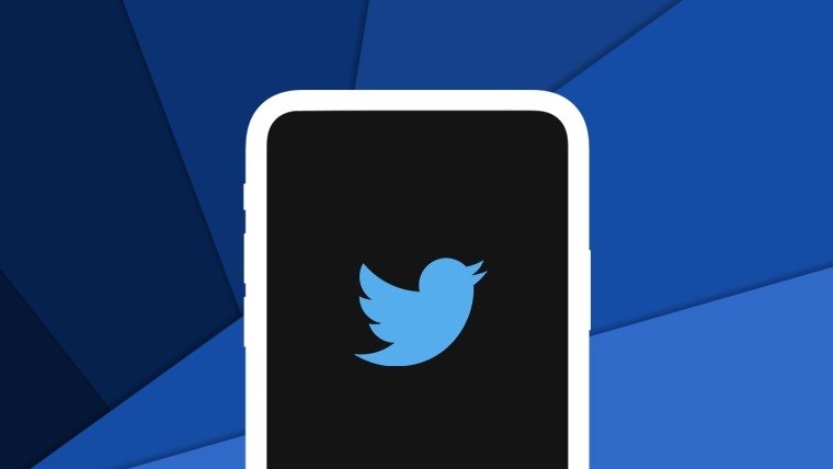 Twitter logo in a phone silhouette on a blue background