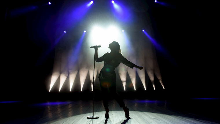 A woman on stage