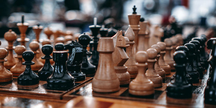 Chess pieces on a board