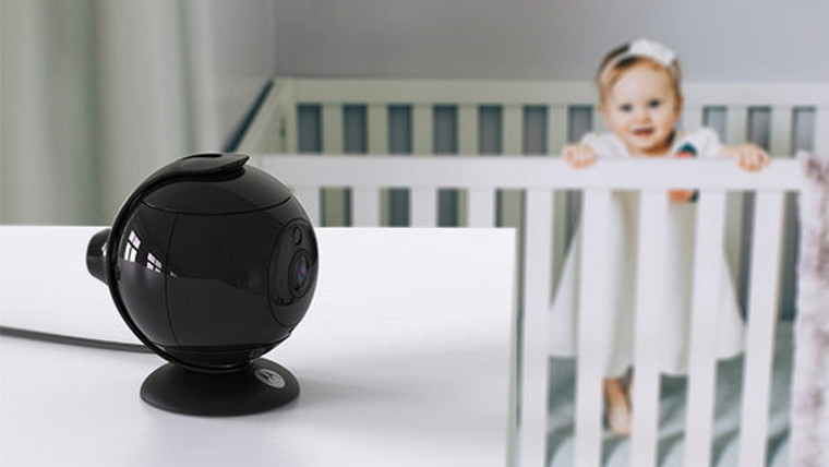 camera pointing to baby in crib