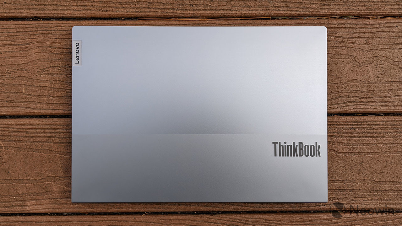 Lenovo ThinkBook 15p with closed lid on wooden background