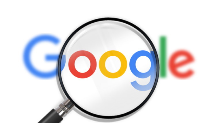 Magnifying glass over google logo