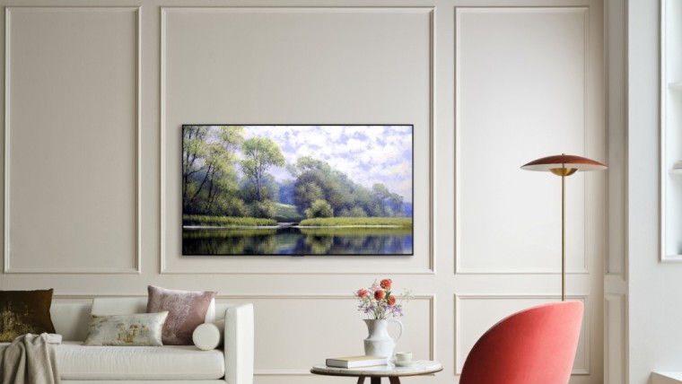 An LG G1 TV mounted on a living room wall