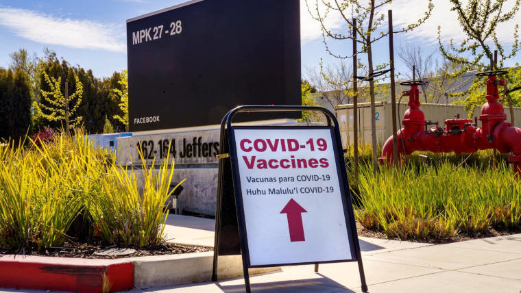 A COVID-19 vaccine sign outside of Menlo Park