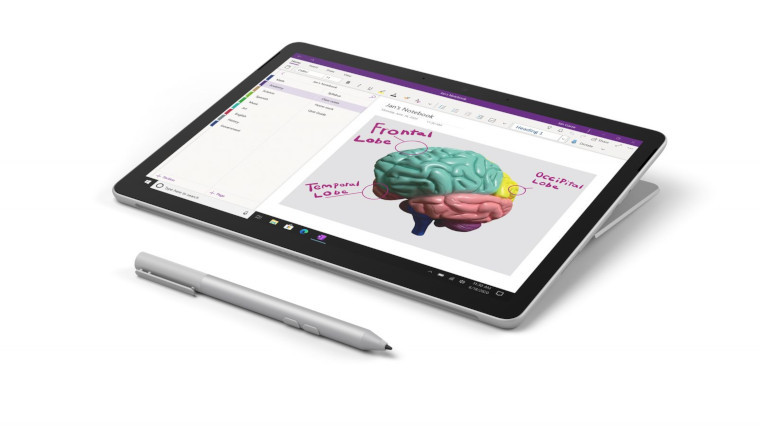 The Microsoft Classroom Pen 2 next to a Surface device