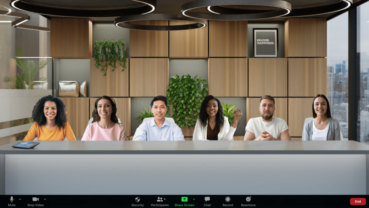 A Zoom meeting with participants placed in a virtual office room