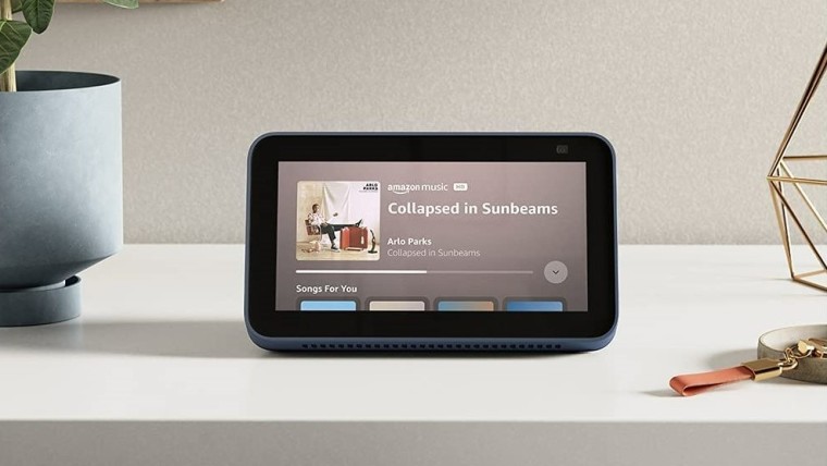 Front view of the new Echo Show 5 playing a song on Amazon Music