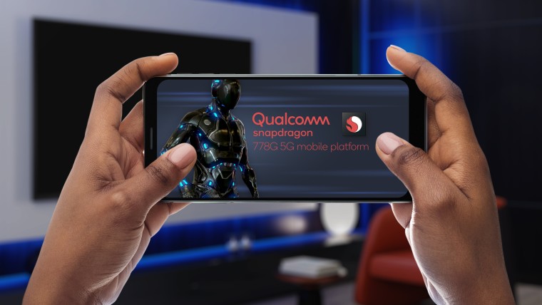 A smartphone displaying the Qualcomm Snapdragon 778G logo with a generic game character