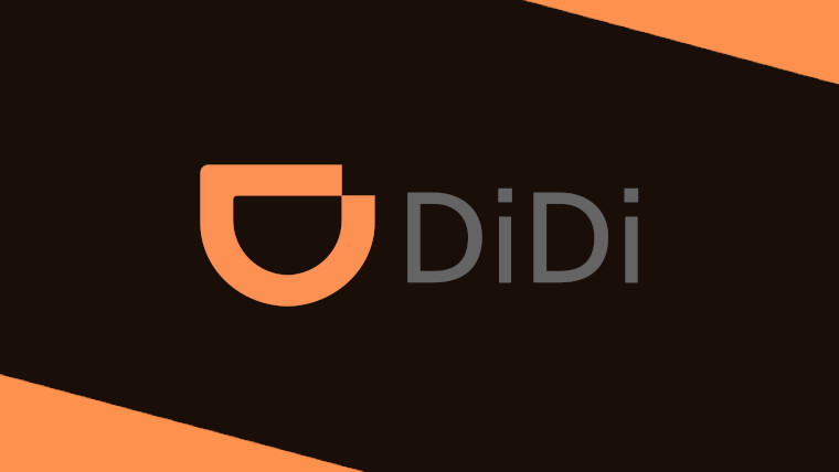 The Didi Chuxing logo on a brown and orange background