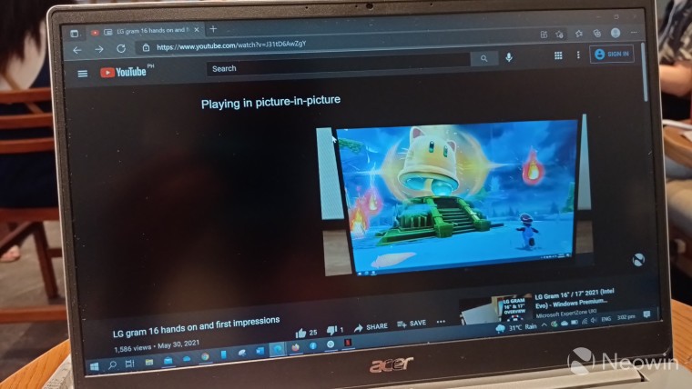 A YouTube video about an LG laptop playing in picture-in-picture mode