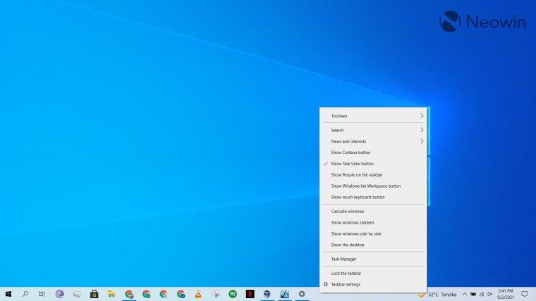 A screenshot of a desktop with the right click context menu of Taskbar open on Windows 10