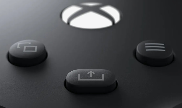 The Share button on a black Xbox Wireless Controller