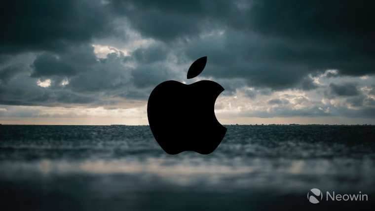 The Apple logo in front of storm clouds