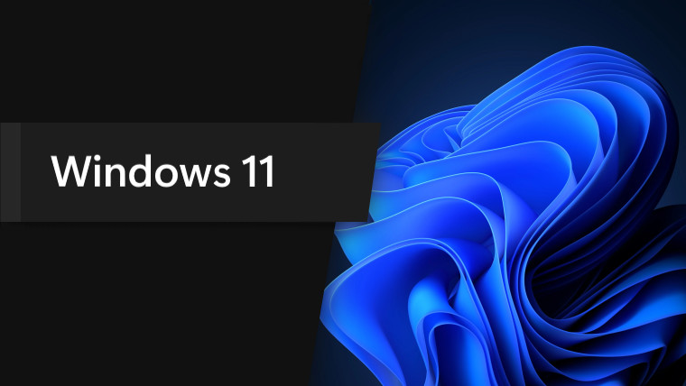 Windows 11 promo with the bloom wallpaper on background