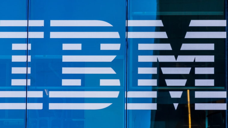 The IBM logo on the building's glass window facade