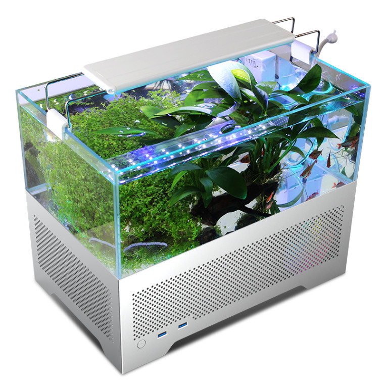 A silver PC case with a fish tank above it