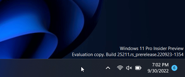 The old pre-redesigned system tray in Windows 11 Dev