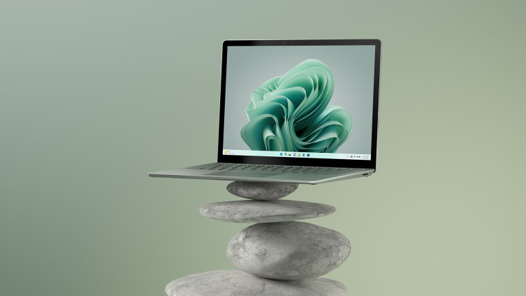 Surface Laptop 5 balancing on rocks