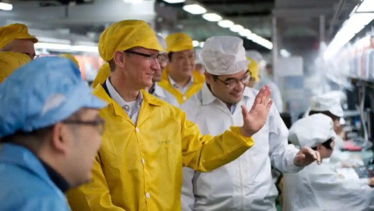 Apple boss Tim Cook visits an iPhone production line in Zhengzhou China Photograph AP