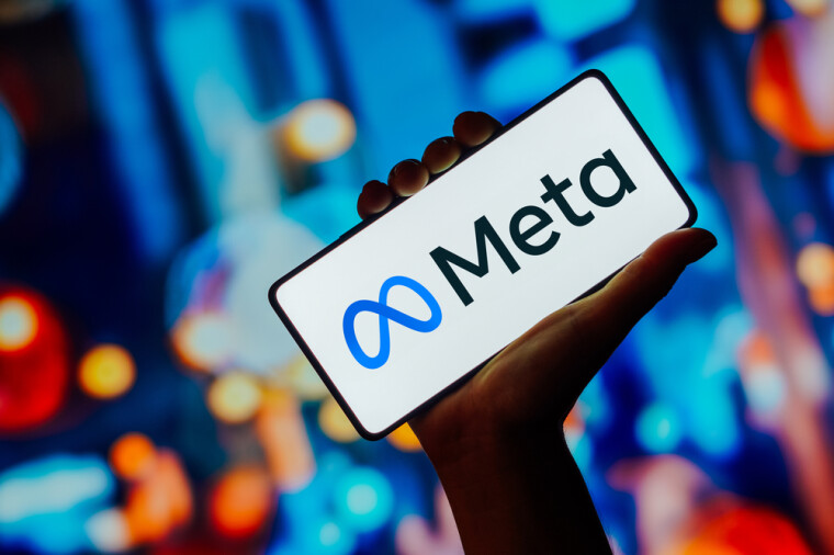 The Meta logo on a phone