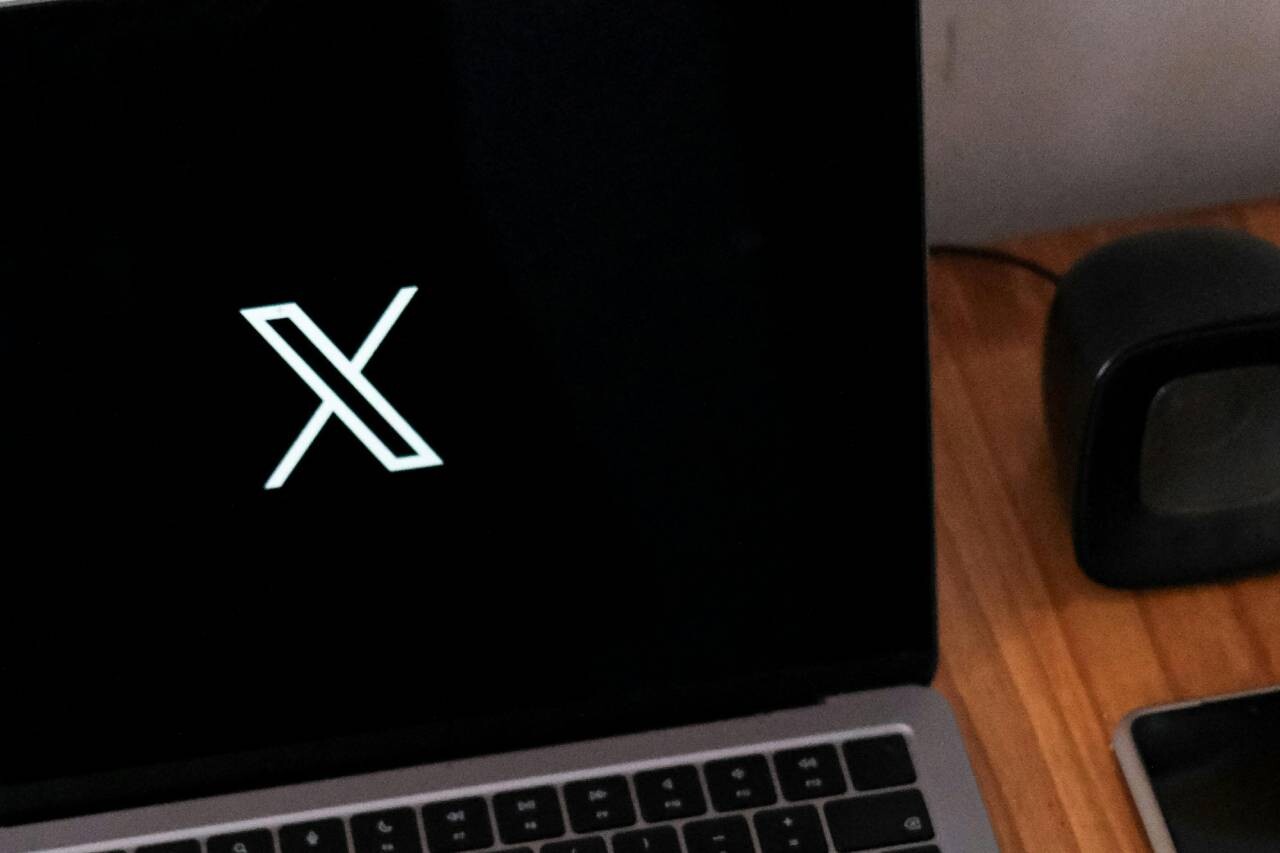 X logo on MacBook