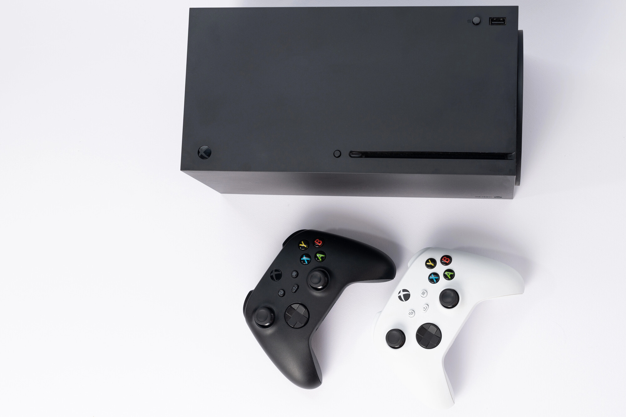 Xbox Series X with two controllers