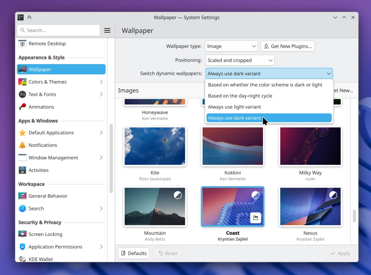 सिस्टम सेटिंग्ज वॉलपेपर पृष्ठ प्रकाश किंवा गडद वॉलपेपरसाठी पसंती नोंदविण्याची क्षमता दर्शवित आहे