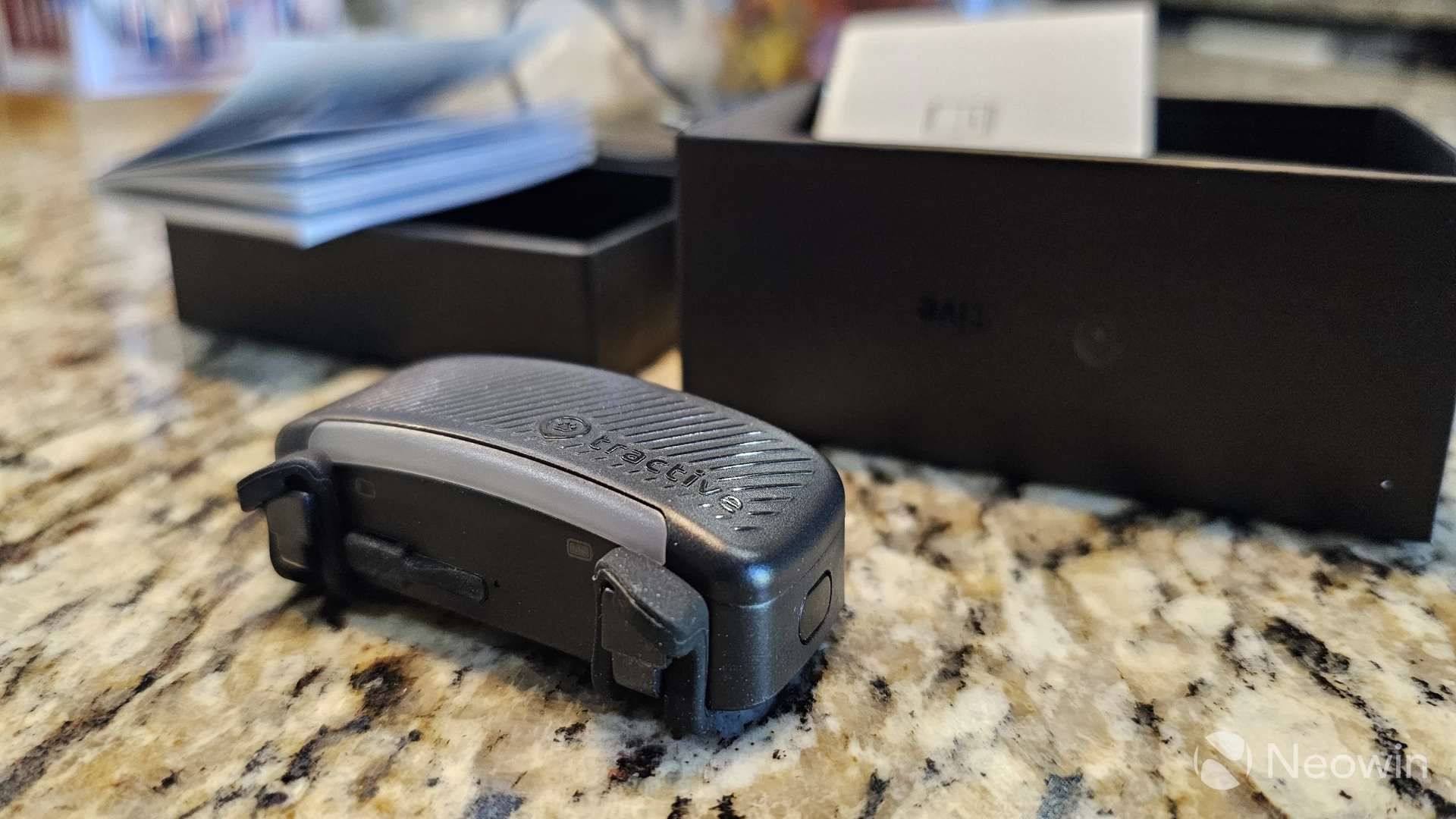 Photo of the Tractive in front of the box