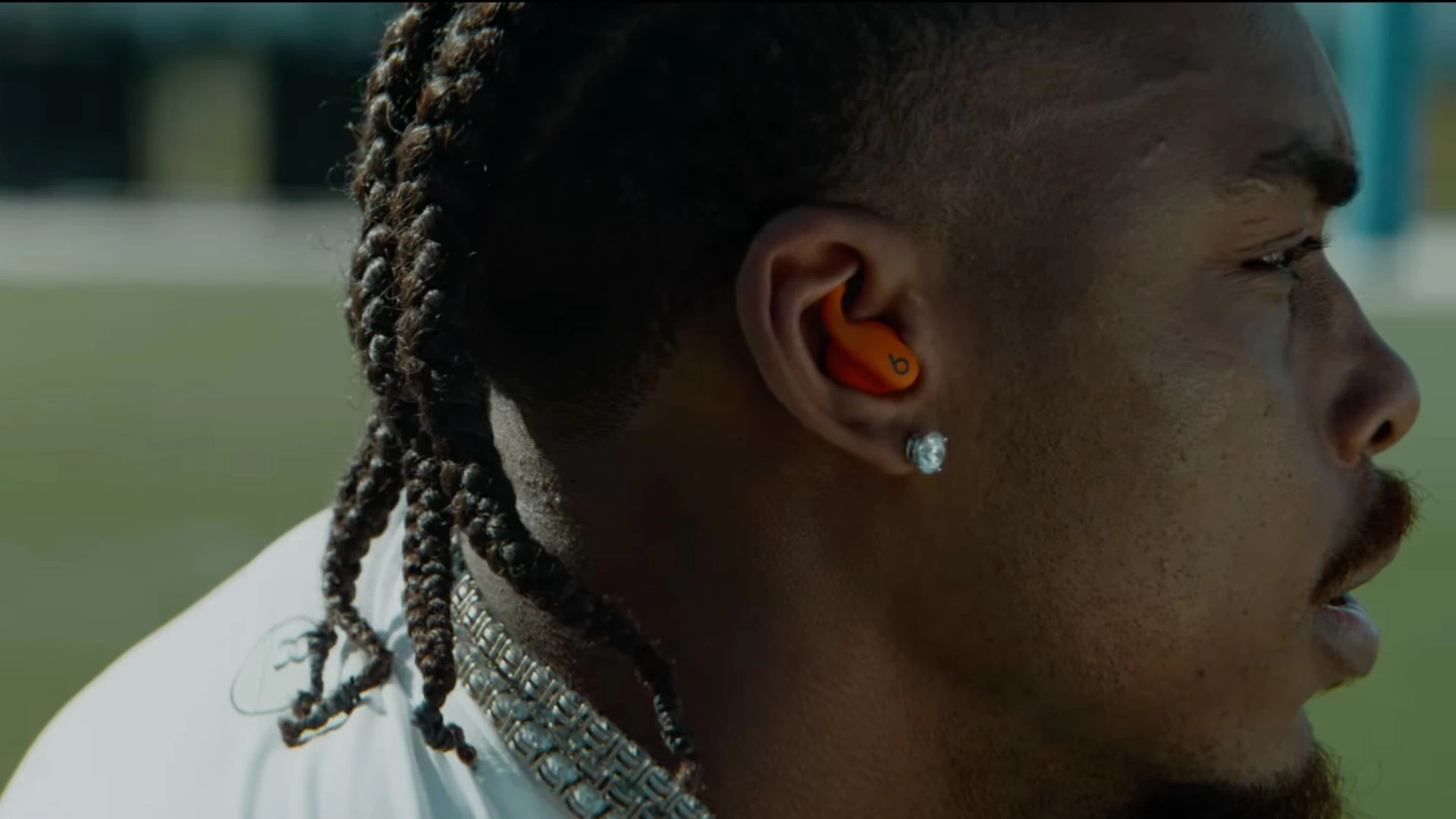 Apple teases new wireless earbuds Powerbeats Fit for a 2025 launch