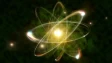 an atom showing a nucleus and orbiting electrons