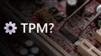 A motherboard with tweezers and TPM written over it