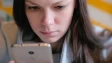 Woman using smartphone