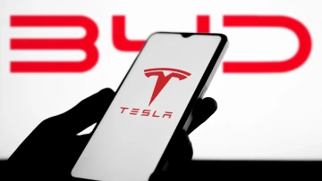 The Tesla and BYD logos