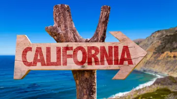 A sign pointing to California