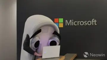Clippy working in Microsoft office on a laptop