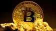 Bitcoin behind gold nuggets
