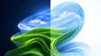 Windows 11 Bloom wallpaper with Windows XPs Bliss in it