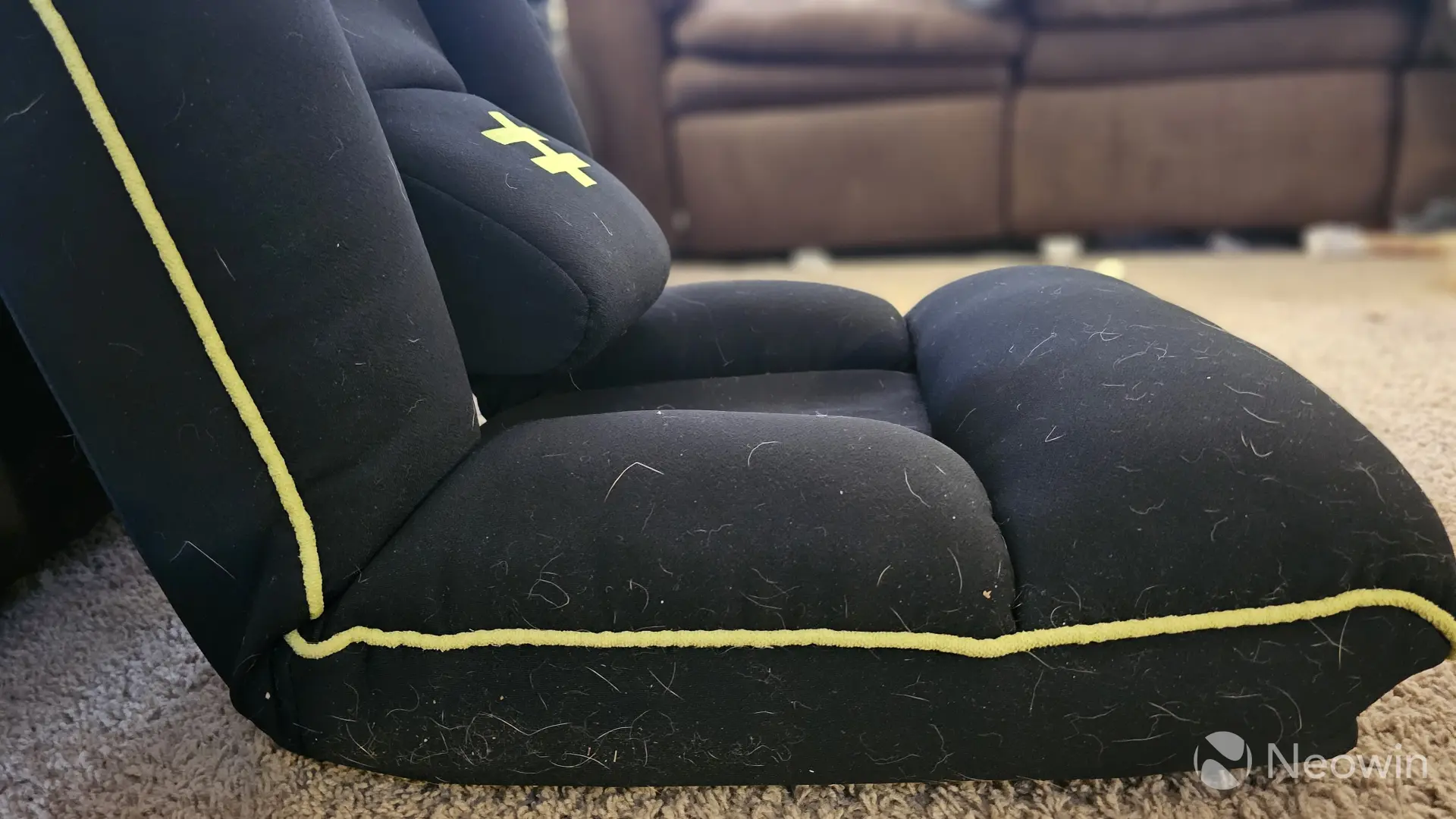 Side view of the Seena GCP-10A floor gaming chair showing lumbar support out and leaning back slight