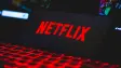 Netflix logo on top of a keyboard