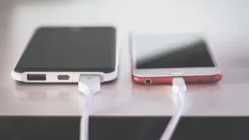 two phones charging side by side