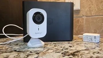 Photo of the Synology CC400W camera in front of the BeeStation