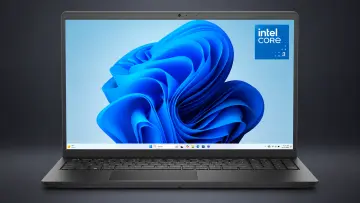 Dell laptop with a Windows 11 desktop displayed on its screen featuring an Intel Core 3 processor ba