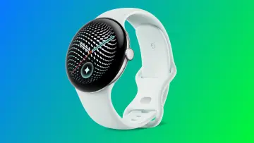 Google Pixel Watch with a silver case white band and a patterned analog display set against a blue-t
